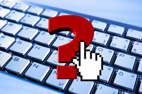 question about what is internet marketing is answered with a mouse pointer and question mark over a computer keyboard